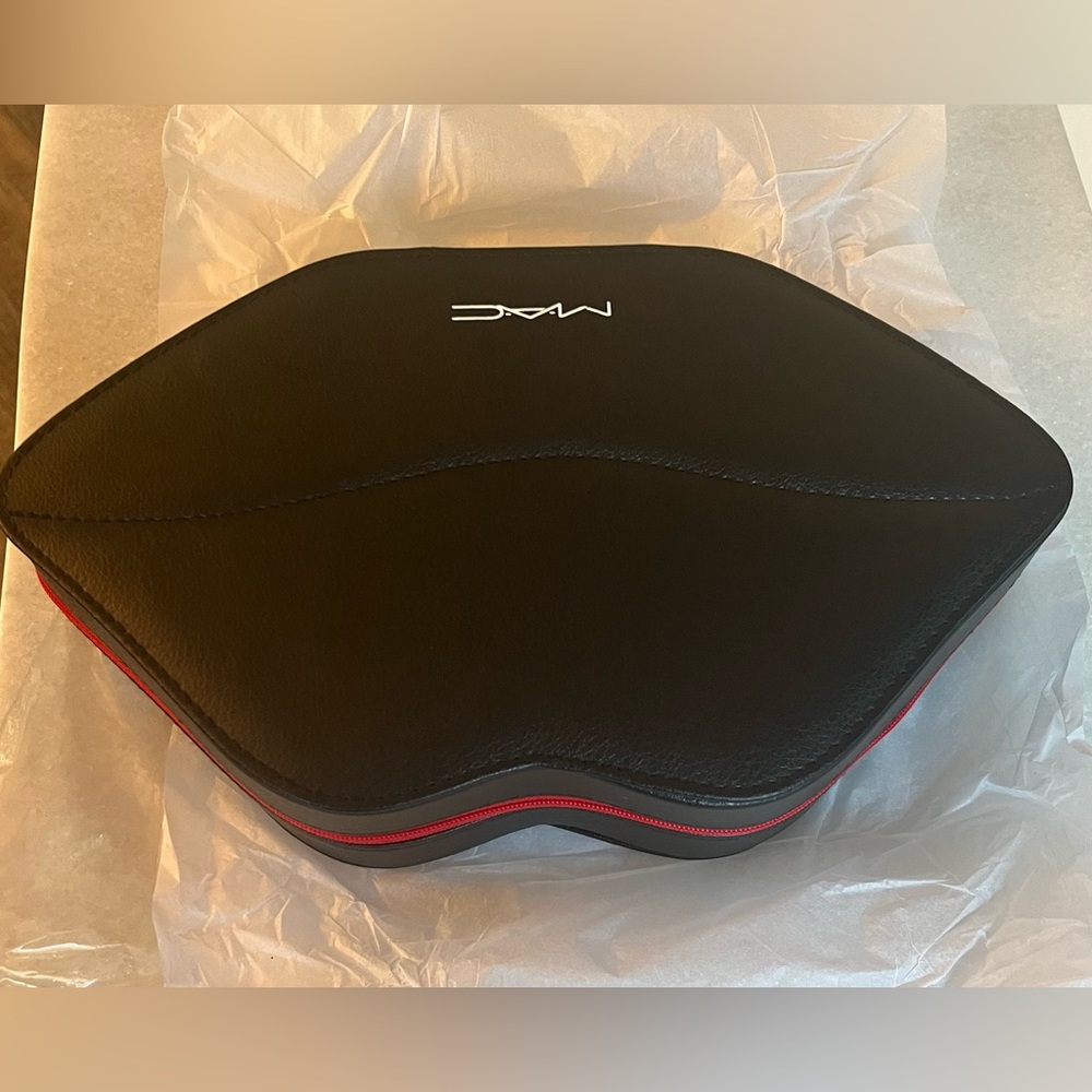 MAC Black Makeup/Jewelry Lip shaped clutch.